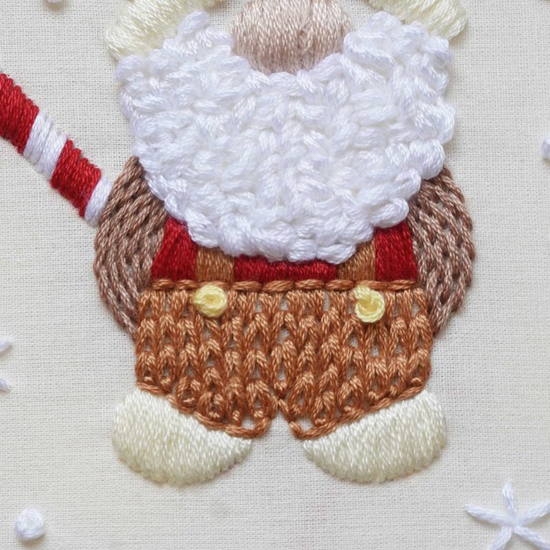 Hand embroidery of a gnome