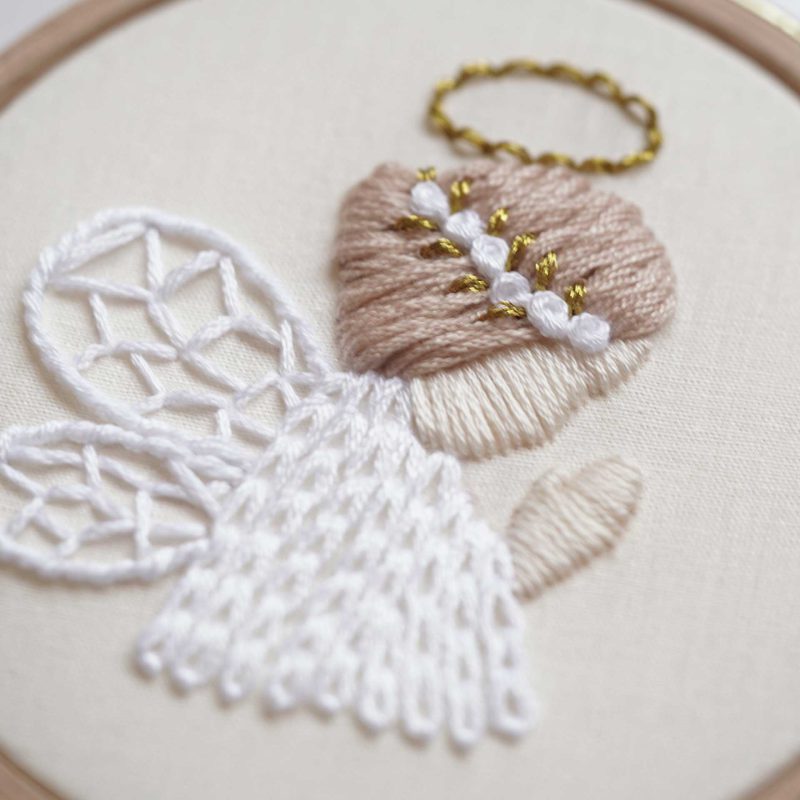 Embroidery of an angel praying