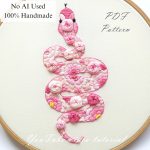 Pink snake-embroidery