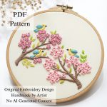 Birds among cherry blossoms embroidery